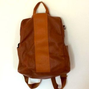 Burnt orange back pack purse